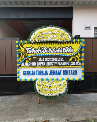 Papan Bunga Duka di Kareko